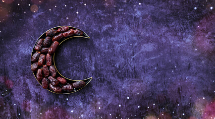 Dates in a moon shaped plate Islamic Iftar and Eid Al Adha concept background, colorful dates image decorated with  shape of crescent moon  © sarath