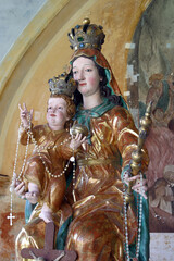 Fototapeta premium Madonna with the infant Jesus on a throne in the church of Our Lady of Jerusalem at Trski Vrh in Krapina, Croatia