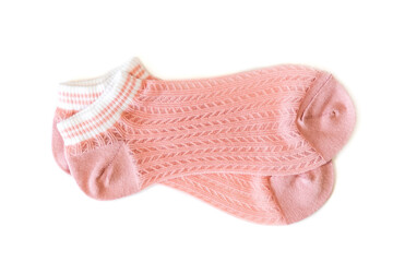 Pink pair of women's thin socks on a white isolated background.