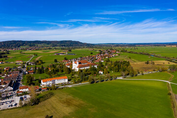 Fototapeta na wymiar Aerial view of Schlehdorf monastery with parish church St. Tertulin on Kochelsee, Schlehdorf Upper Bavaria, Bavaria, Germany