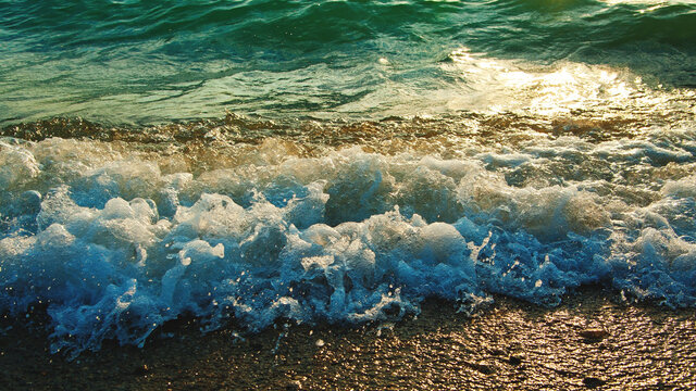 Wave in the sea on the beach. Panorama.