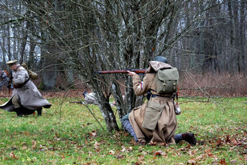 Estonian soldiers are attacking in the forest. 1918 year
