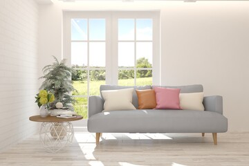 White stylish minimalist room with sofa and summer landscape in window. Scandinavian interior design. 3D illustration