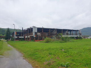 POTOCARI, SREBRENICA, BOSNIA AND HERZEGOVINA - June 01 2020: The place where murdered men and young boys in Potocari, victims of Srebrenica genocide and factory where prisioners were.