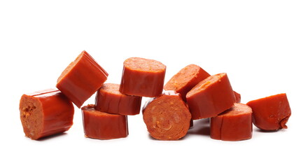 Thin sausage chopped up into round slices for grilling isolated on white background