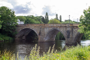 Fototapeta na wymiar The road bridge that crosses the River Tees at Yarm, North Yorkshire