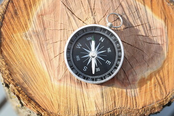 Old compass on natural background