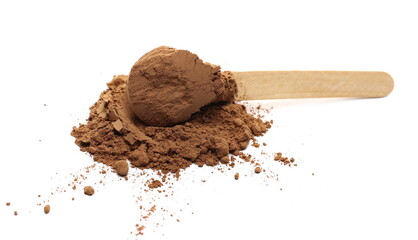 Cocoa powder pile with wooden spoon isolated on white background