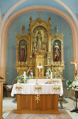 Fototapeta na wymiar High altar in the parish church of the Assumption of the Virgin Mary in Pescenica, Croatia