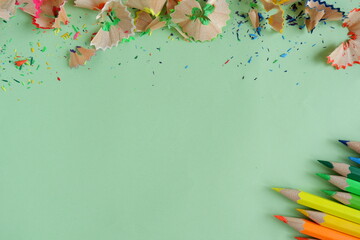 Background from color pencils on green paper.