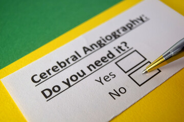 Obraz premium One person is answering question about cerebral angiography.