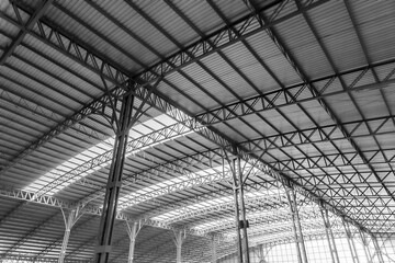 Interior architecture design of warehouse large metal roof structures of steel ceiling.