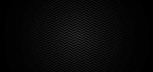 Abstract chevron pattern on black background with lighting