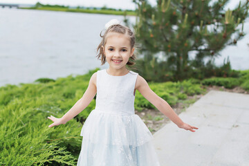 little girl in a white dress