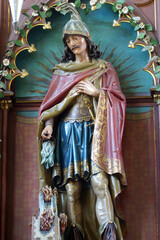 Saint Florian statue on the altar Saint Florian in the parish church of St. Nicholas in Krapina,...