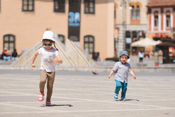 boy running after girl