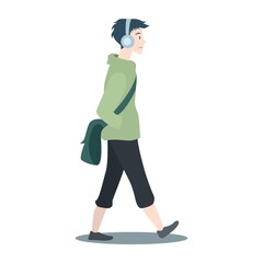 boy walking and listening to music