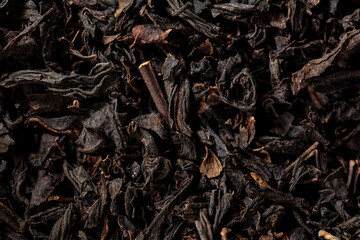 Close up of granules of black tea as a background.