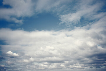 Fototapeta premium Tinted dark blue sky and clouds