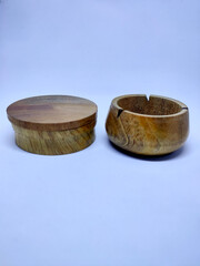 Traditional wooden craft jars for spices. Isolate on a white background. Selective focus.