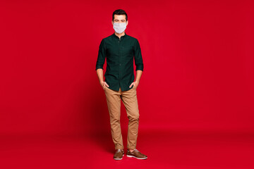 Full length body size view of his he nice attractive guy wearing safety gauze mask stop cov...