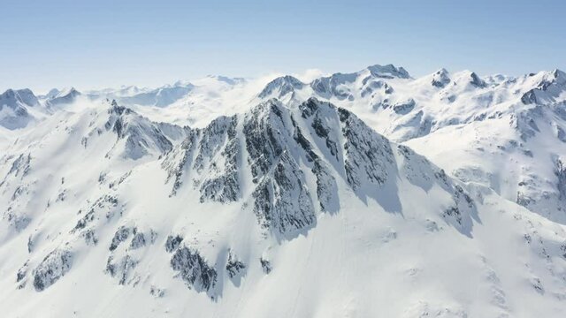 Aerial footage of a mountain range in Switzerland.