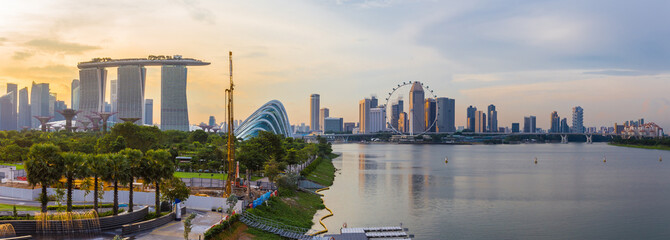 Panorama landscape aerial view of Singapore business district and city at sunset in Singapore, Asia. Singapore skyline