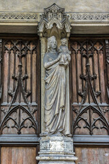 Obraz premium Saint-Germain-l'Auxerrois Church situated in Paris, France. Founded in 7 century, church rebuilt many times over several centuries. Sculptures at the entrance to the church.