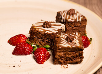 Homemade cake with chocolate and strawberries