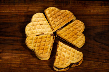 Heart cake with cocoa cream  in a basket