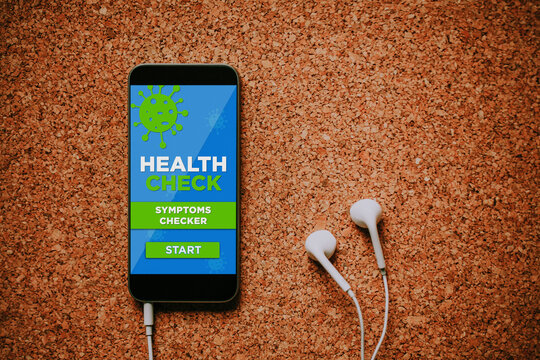 Health And Symptoms Checker Service App In A Mobile Phone Screen.