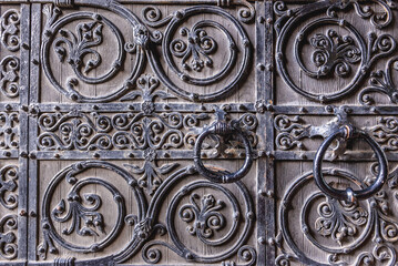 Metal entrance door of Scottish Episcopal cathedral of St Mary in New Town of Edinburgh city, Scotland, UK