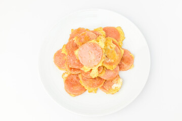 Pink sausage on white background