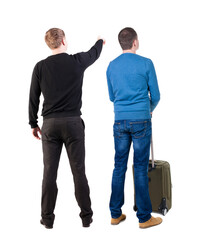 Back view of two man in sweater with suitcas.