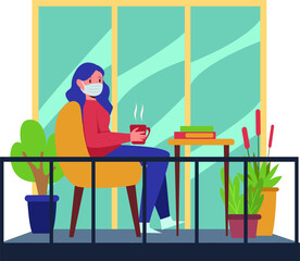 Woman is relaxing on her home balcony while having some cup of hot tea