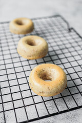 Mini donuts on a baking grid