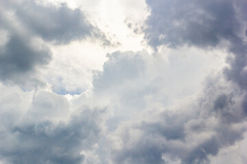 Dramatic sky with dark cumulonimbus and stormy clouds before raining on day noon light