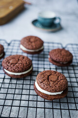 Chocolate whoopie pies on a baking grid