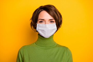 Close-up portrait of her she nice pretty girl wearing gauze safety mask stop contagious ncov cov mers pneumonia syndrome cdc isolated bright vivid shine vibrant yellow color background