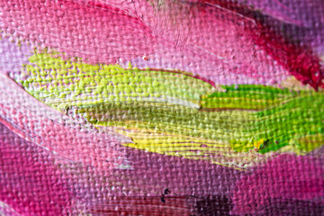 Abstract pink background with oil paint on canvas. Abstract art background. Creative process. Closeup of strokes of the painting. Design background with hand work. The art of oil painting.