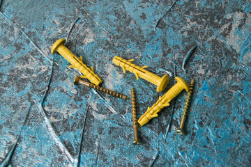 lot of dowels on the background of decorative putty blue