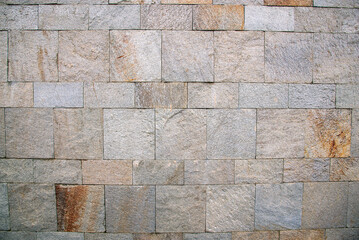 The masonry of the ancient wall consists of regular-shaped stone blocks