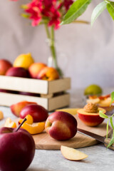 nectarine on the cutting Board in the kitchen. fresh fruit on the table in the drawer