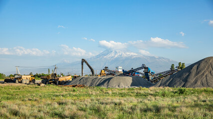 Fototapeta premium Construction machine and building material