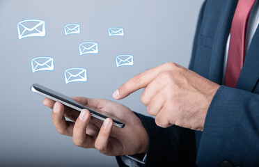 man hands using phone with digital email icons