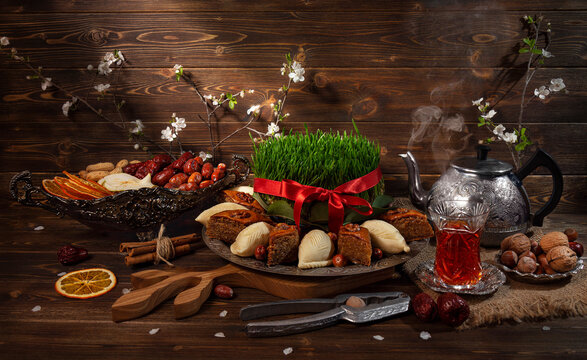 Novruz table with shekerbura and tea
