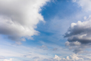 Summer day and blue sky with volumetric clouds. White clouds and blue sky.