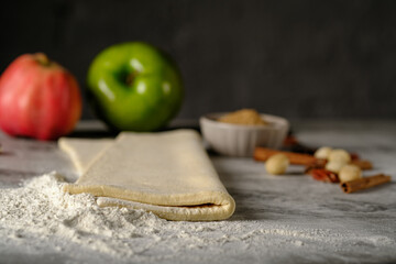  Traditional puff strudel with apple Raw pie dough.