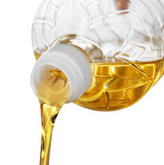 Pouring oil for cooking in a bottle isolated on white background.