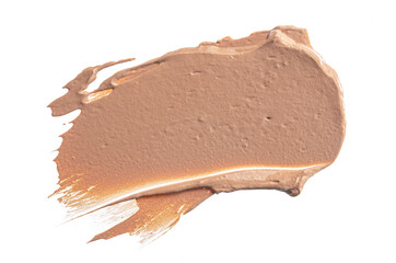 Smudged stain of a cream foundation isolated on white